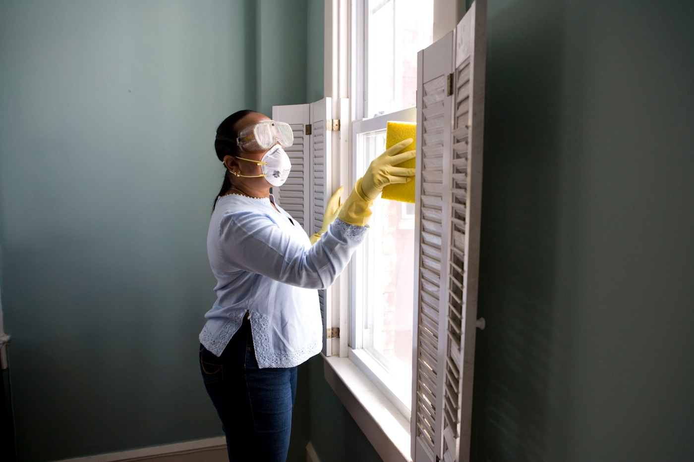 Professional cleaner with equipment — representing EEB's trained, vetted crew